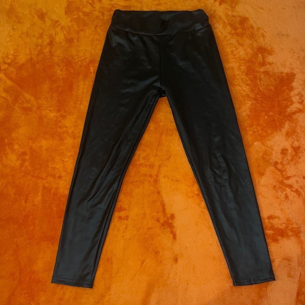 Black leather skinny pants